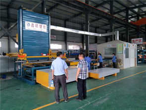 東莞三通板業(yè)碼垛機器人凈化板設備安裝完畢投入生產